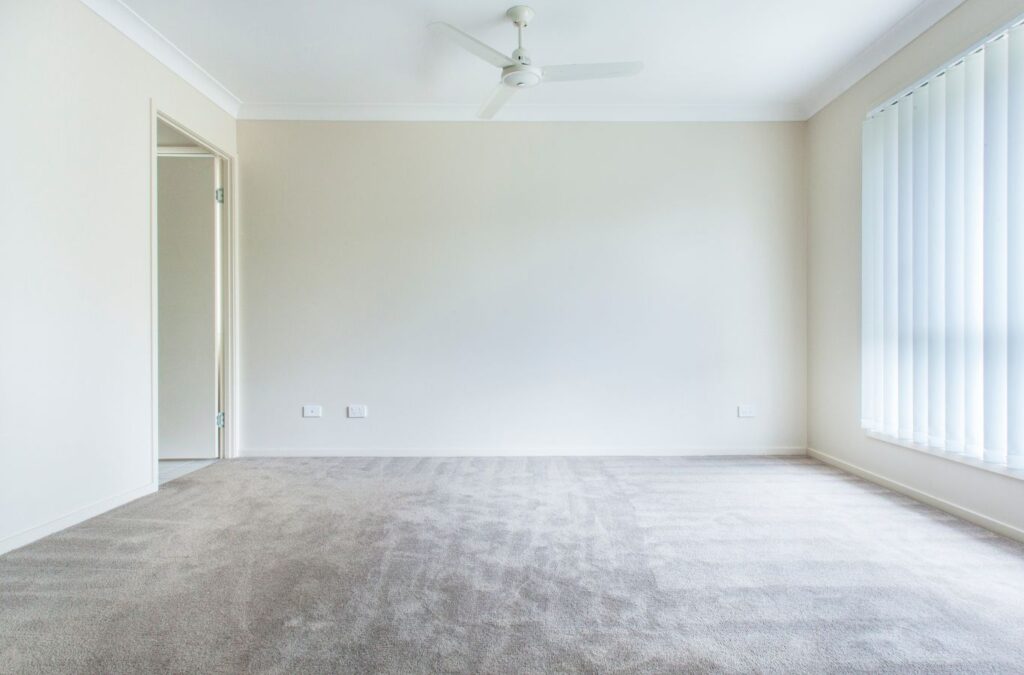 A Honeycomb Home Cleaning specialist thoroughly cleaning an apartment during a move out cleaning in Granada Hills, CA, highlighting the benefits of professional services.